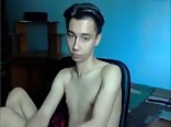 A beautiful smooth boy with nice eyes masturbates