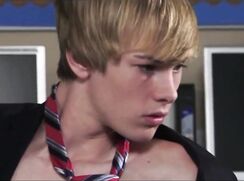 A BLOND BOY IN A HARD PHOTO SESSION