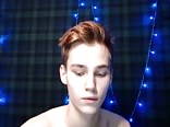 A cute boy with beautiful eyes masturbates
