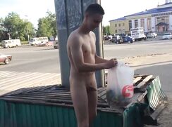 A Russian lad strips off and shows off on the street