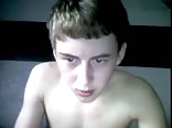 a smooth boy of great beauty masturbates in his bed
