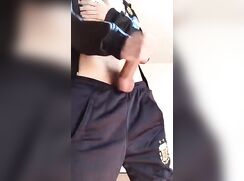 a twink in trackies having a wank