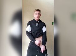 Adrian cumming in a gym uniform