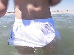 AT THE NUDE BEACH