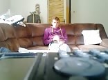 beautiful blonde is filming in her living room 