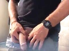 Big dick peeing in a public toilet