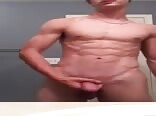 Black boxers come off for stroking action in the bathroom boys porn