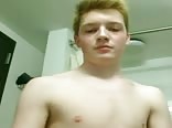 Blond boy playing with himself