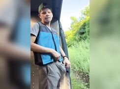 Blond delivery guy pissing outside