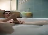 Boy has fun in the bathtub
