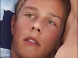Boy posing and masturbate on a bed