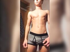 BR - Handsome hunk showing his perfect body and plays with a banana