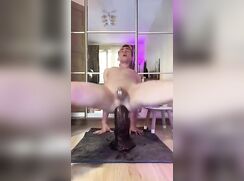 Caged twink with monster dildo