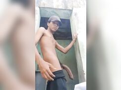 Carlos shows his limp Horse Cock Outside