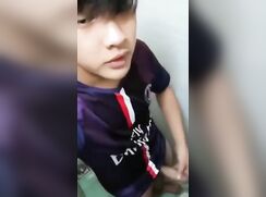 Chinese boy does a selfie wank