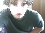 Curly haired boys porn jacks his dick watching videos