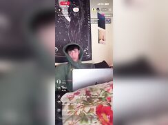 Cute boy jerks and cums while being live