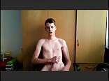 Cute boy wanks and shoots on his face