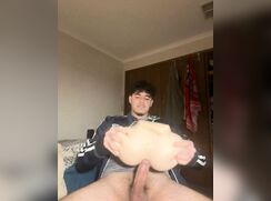 Cute Latin guy pumps his toy