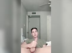 Cute slim boy wanks and cums