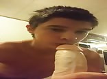 Cute  Twink sucks on fat dildo 