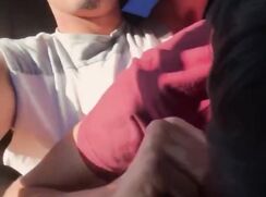 Diego and older friend in car
