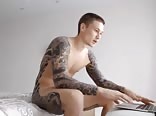Dressed in a tattoo gay tube webcam streamer