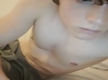 European boy plays with hole on webcam
