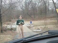 Exhibitionist twink strokes cock in public park