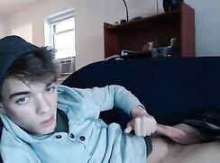 Fit lad edges his cock until he squirts cum everywhere