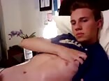 Gay porn teenager strokes his dick in his green boxers