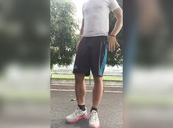gay-with-curved-cock-jerks-off-outside-and-cums-399