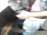 Giving brother a handjob on train