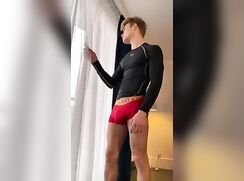 (GR) Blond boy starts playing with his cock over his red boxers