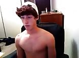 Gum-chewing jock boy cums on webcam