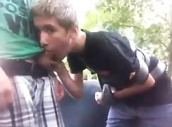 Horny teen sucks and gets fucked in public by his friend
