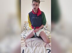 Hot boy plays with his diaper