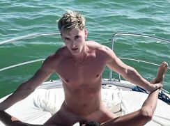 Hot guys having some good sex on a boat off shore.