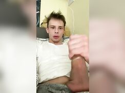 Hotboy cums in  condom in his bed