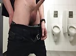Jerking off in a public toilet