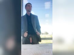 Jerking off in front of a big window