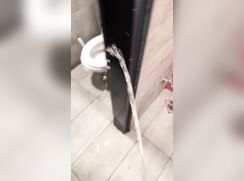 Nasty guy pissing all over the public restroom