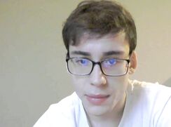 Nerdy guy shoves a dildo up his hole while wanking