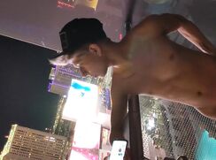 Nude on a balcony