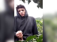 Outdoor - Lad stroke his dick outside