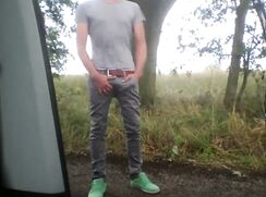 Playing cock at the roadside and cums