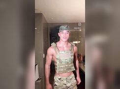 Playing with his gun