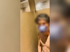 Public bathroom boy takes off his clothes