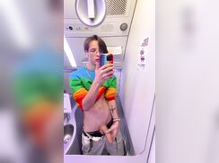 Rainbow cutie jacks off in the plane's lavatory