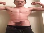 Showing his muscles and jerking the muscle between his legs boys porn